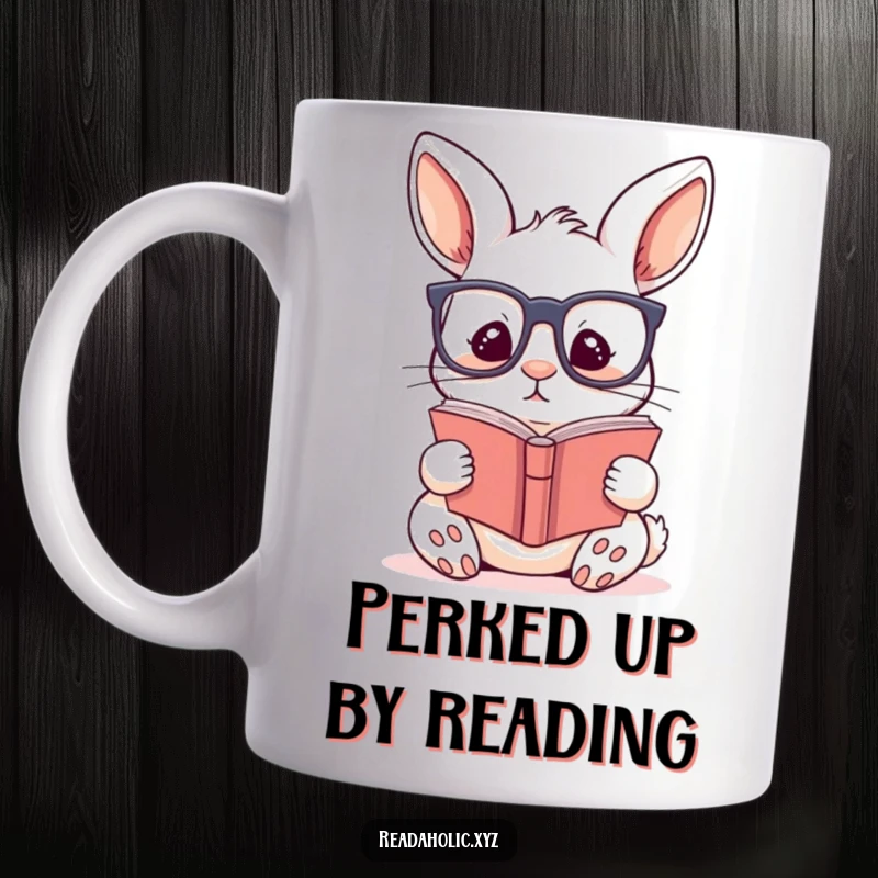 Funny kawaii rabbit reading mug, wearing glasses and engrossed in a story, perfect for cozy moments and book lovers.